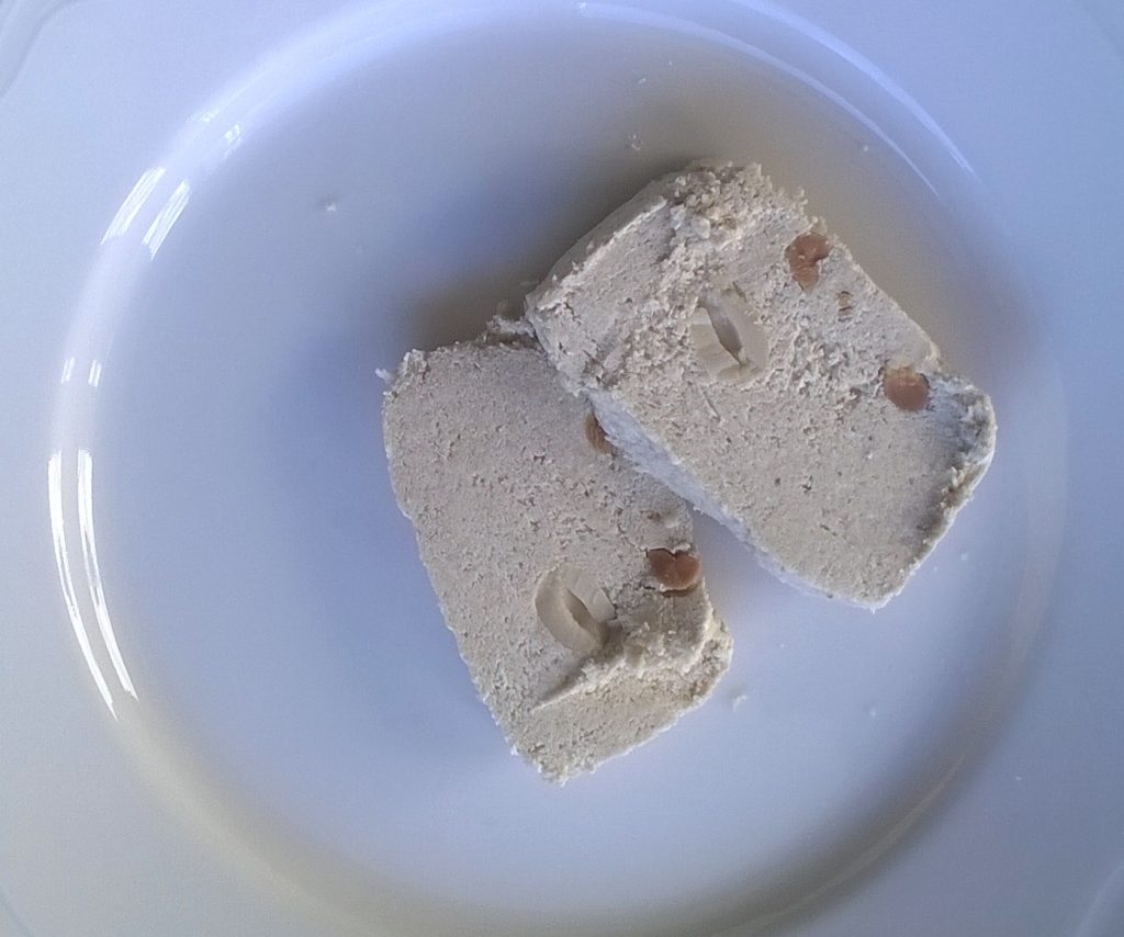 Two slices of Olympos Halva Peanuts by Papayianni Bros