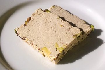 Two slices of halva with pistachio
