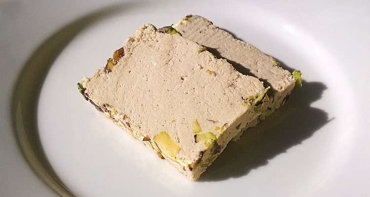 Two slices of halva with pistachio