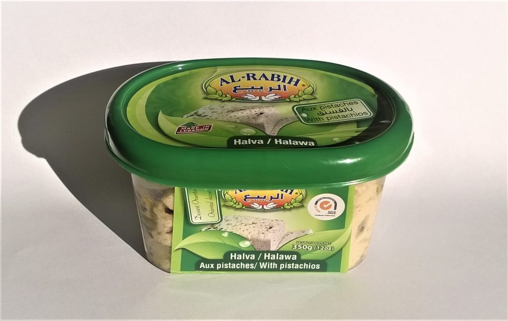 Plastic container with Halva with pistachios by Al-Rabih