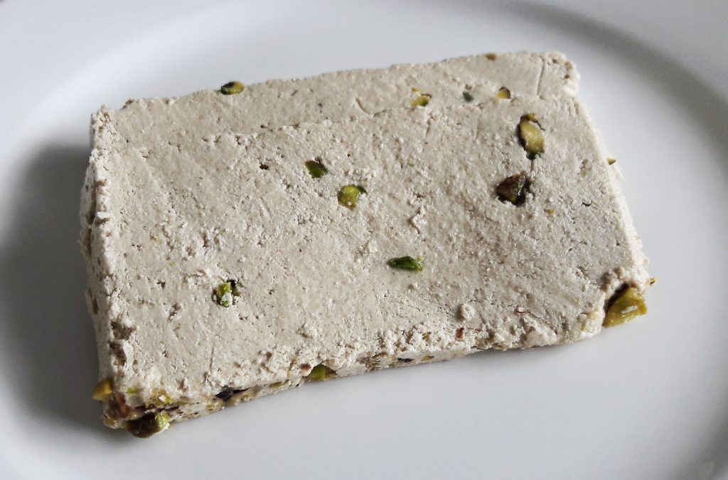 Two slices of Helwa Tat-Tork with Pistachio by Camel Brand