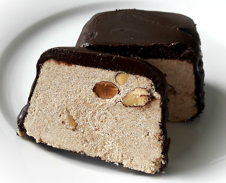 Cut of Eridanous Halva with Almonds and Dark Chocolate Coating