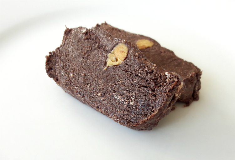 Two slices of Olympos Halva with Bitter Chocolate & Almonds